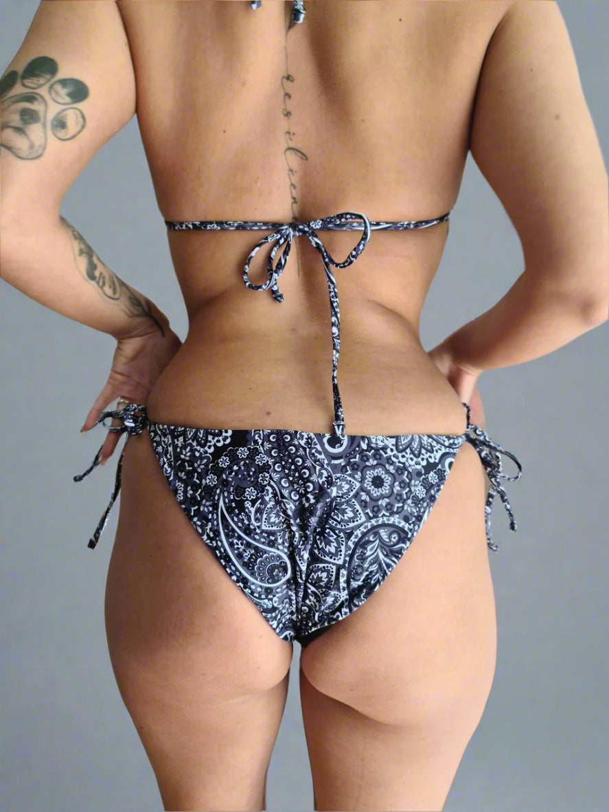 Back view of woman wearing  bikini  